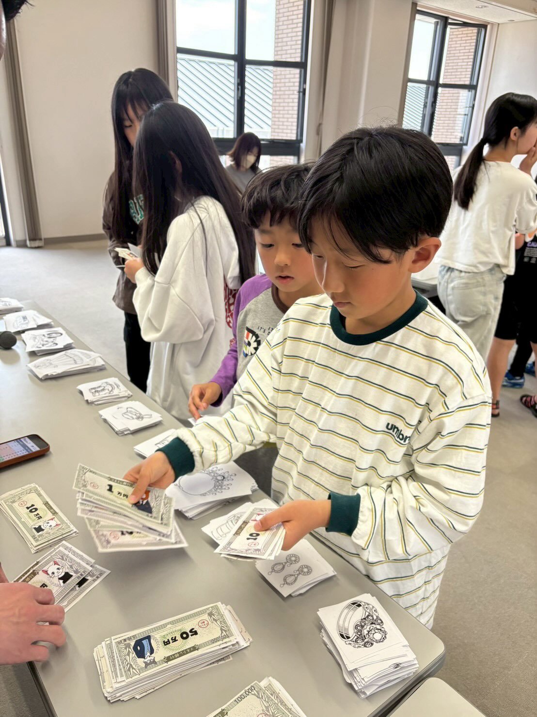 マネトレキッズで学ぶ子どもたち